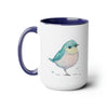 15oz two toned mug with blue interior and handle with glossy finish in colorful light aqua blue, light yellow and light pink pastel of a standing  bird design in water color style right view