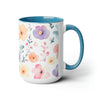 15 oz Two-Toned Mug with Light Blue Interior and Handle, Glossy Finish. Pastel Watercolor Style Floral Print in Light Violet, Light Oranges, and Pinks with Green Leaves on a White Background. Left Side View