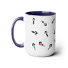 15 oz two toned mug in midnight blue in colorful cartoon style people logo wearing dresses and shirts in colors red, blue, black, white and green in random positions left view