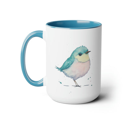 15oz two toned mug with light blue interior and handle with glossy finish in colorful light aqua blue, light yellow and light pink pastel of a standing  bird design in water color style right view