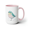 15 oz Two-Toned Mug with Pink Interior and Handle, Glossy Finish, Colorful Light Aqua Blue, Light Yellow, and Light Pink Pastel Standing Bird Design in Watercolor Style. Left side View with a Small Brand Name at the Bottom Left Side of the Mug