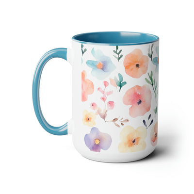 15 oz Two-Toned Mug with Light Blue Interior and Handle, Glossy Finish. Pastel Watercolor Style Floral Print in Light Violet, Light Oranges, and Pinks with Green Leaves on a White Background. Right Side View