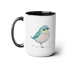 15oz two toned mug with black  interior and handle with glossy finish in colorful light aqua blue, light yellow and light pink pastel of a standing  bird design in water color style right view