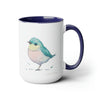 15 oz Two-Toned Mug with Blue Interior and Handle, Glossy Finish, Colorful Light Aqua Blue, Light Yellow, and Light Pink Pastel Standing Bird Design in Watercolor Style. Right View with a Small Brand Name at the Bottom Left Side of the Mug