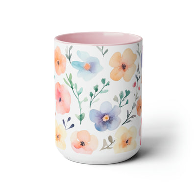 15 oz Two-Toned Mug with Pink Interior and Handle, Glossy Finish. Pastel Watercolor Style Floral Print in Light Violet, Light Oranges, and Pinks with Green Leaves on a White Background. Front View