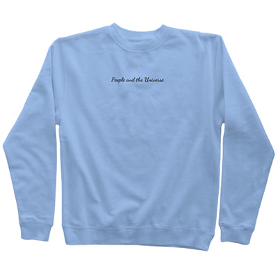 9oz (300 gm) 80% cotton/20% polyester blend  pigment dye sweatshirt in light blue with a  black embroidery of brand name at the center horizontally