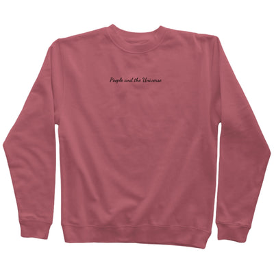 9oz (300 gm) 80% cotton/20% polyester blend pigment dye sweatshirt in maroon with a black embroidery of brand name at the center horizontally